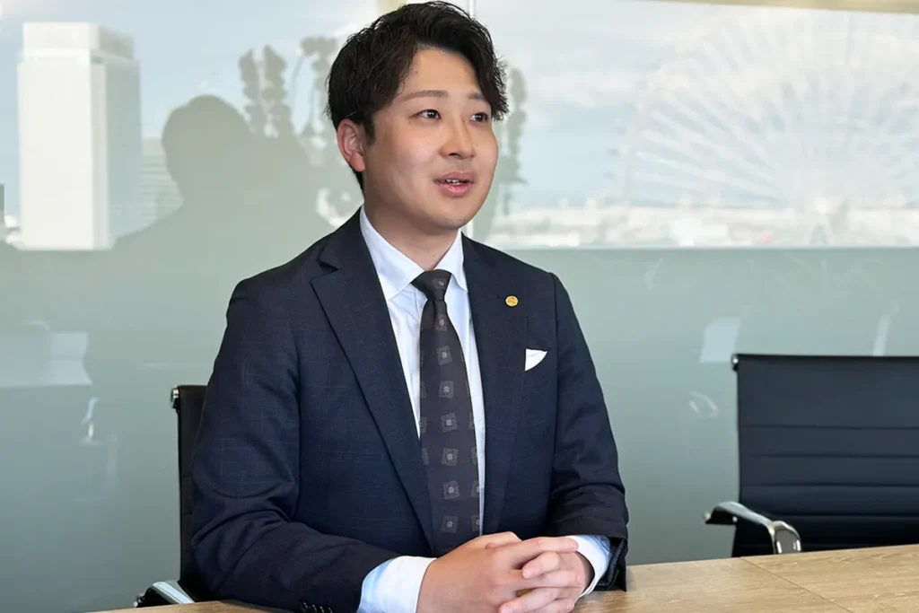 加盟店開発営業部　高池様